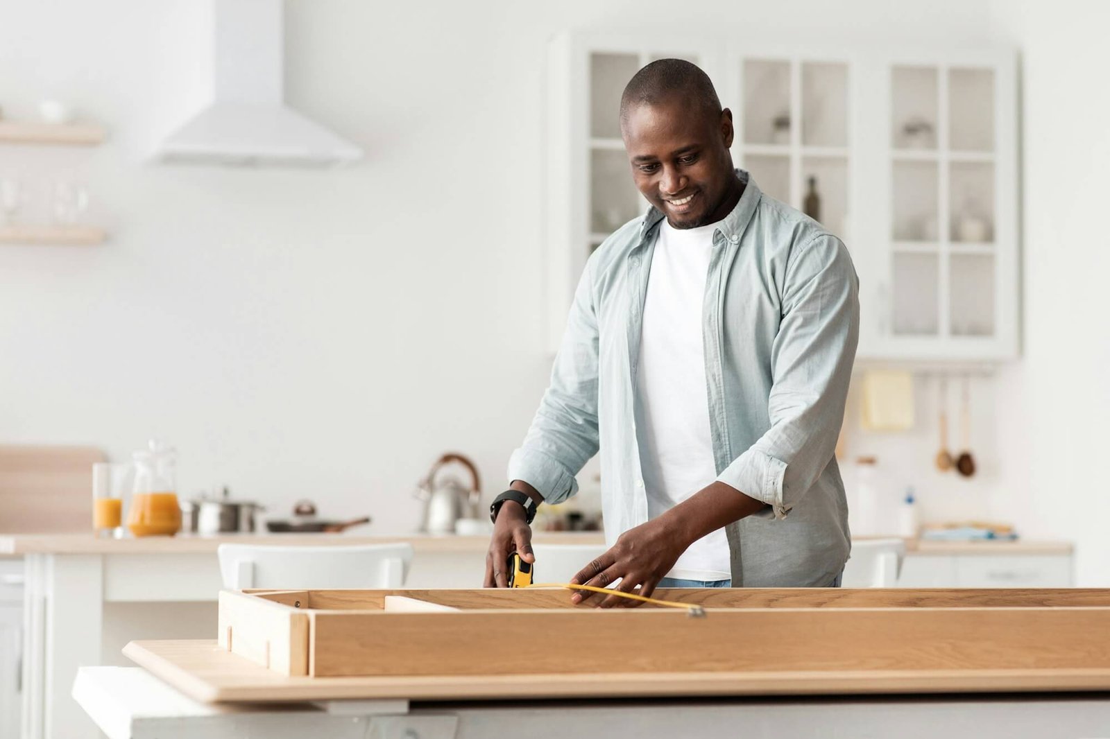 Bathroom remodeling professional measuring for renovation