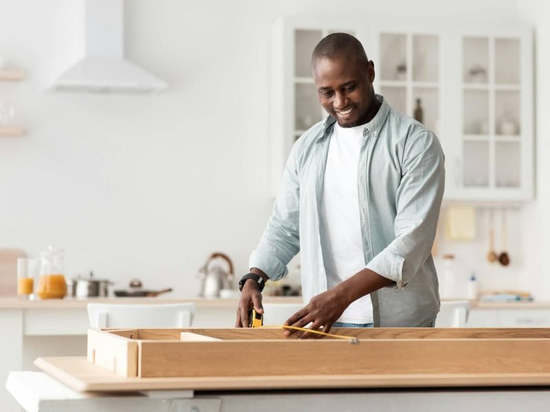 Bathroom remodeling professional measuring for renovation